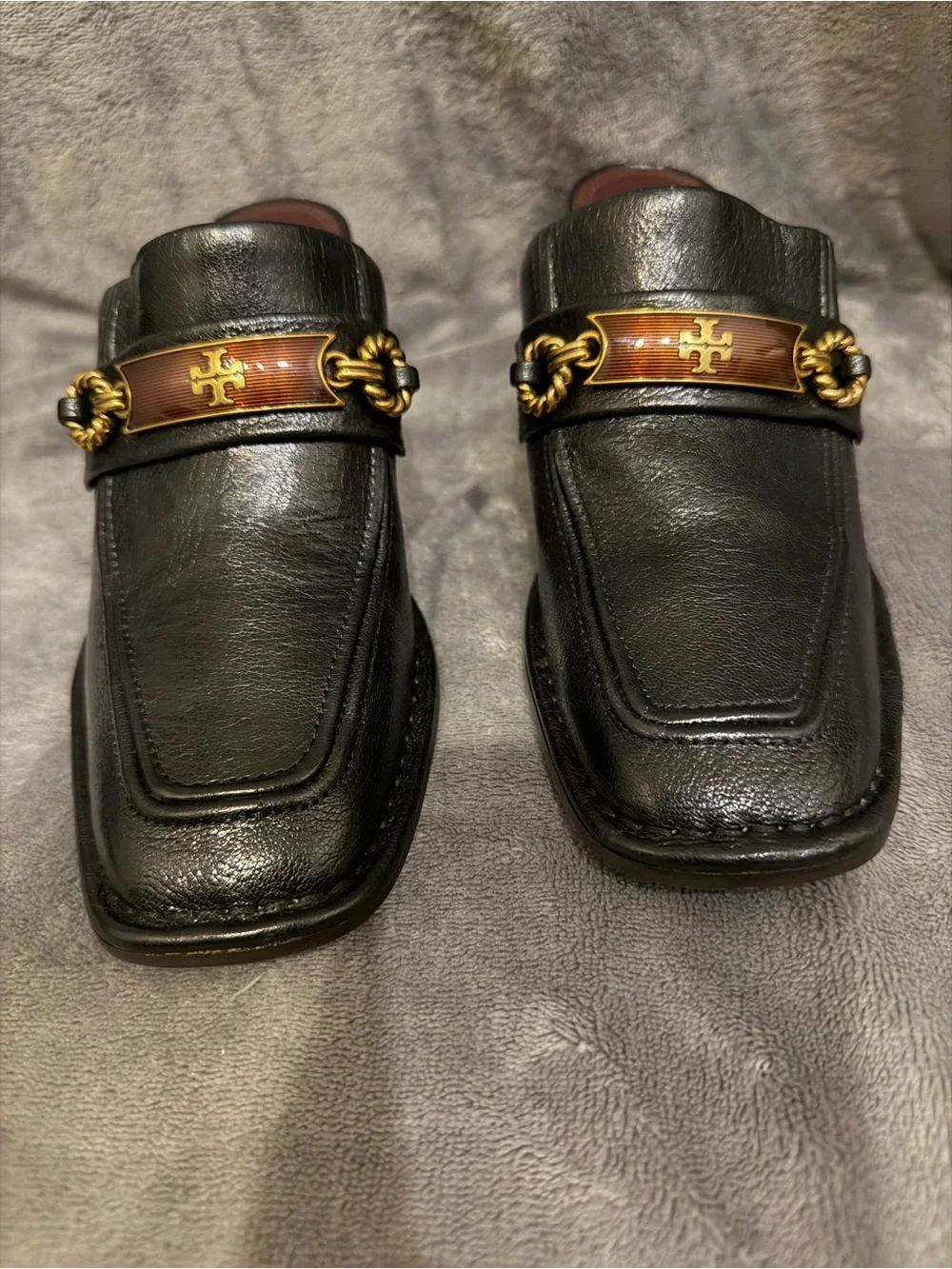 Tory Burch Black Leather Loafers with Gold Chain and Brown Enamel Plaque